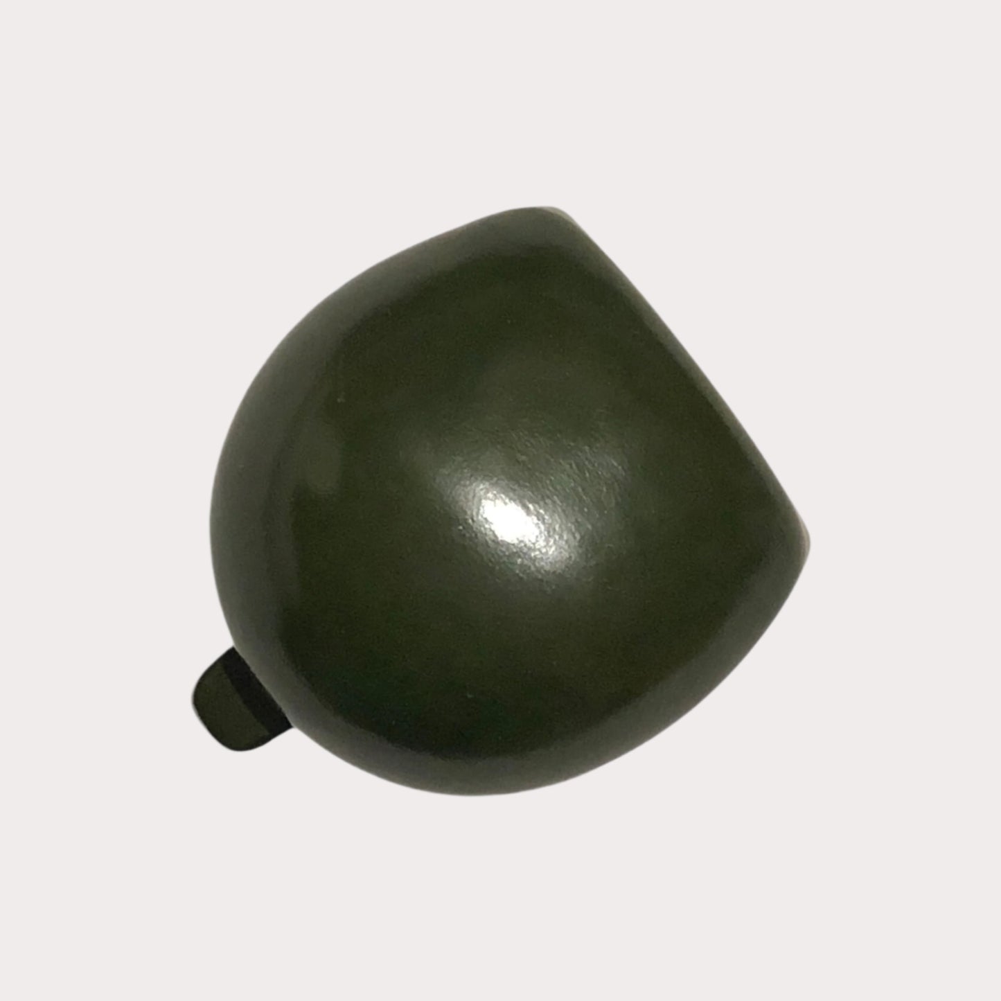 Green Il Bussetto Coin Pouch on a light gray background