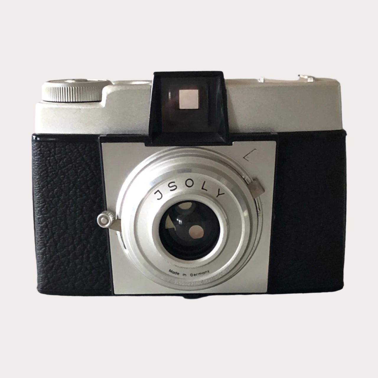 Vintage Agfa Isoly camera with a black and silver color scheme, featuring a large clear viewfinder and a red dot on the top for indicating the shutter release.