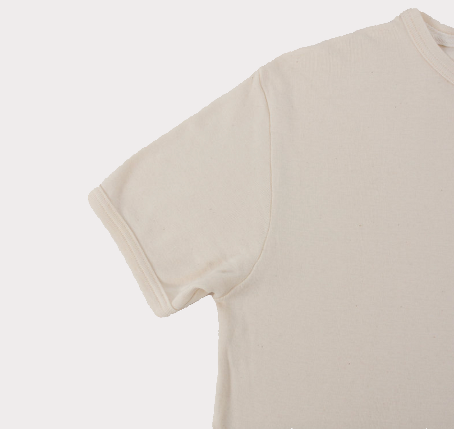 Maison Cornichon Beige t-shirt on a light gray background